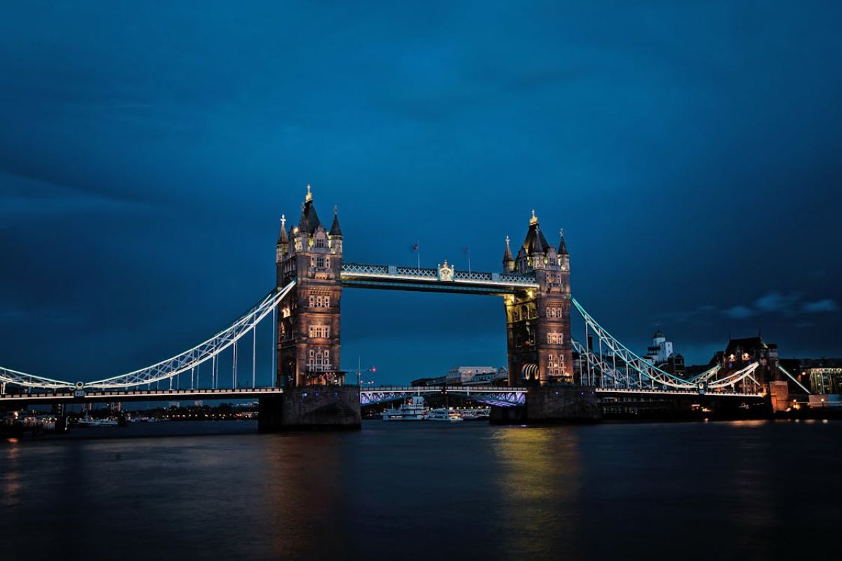 Tower Bridge with towers and lights at night