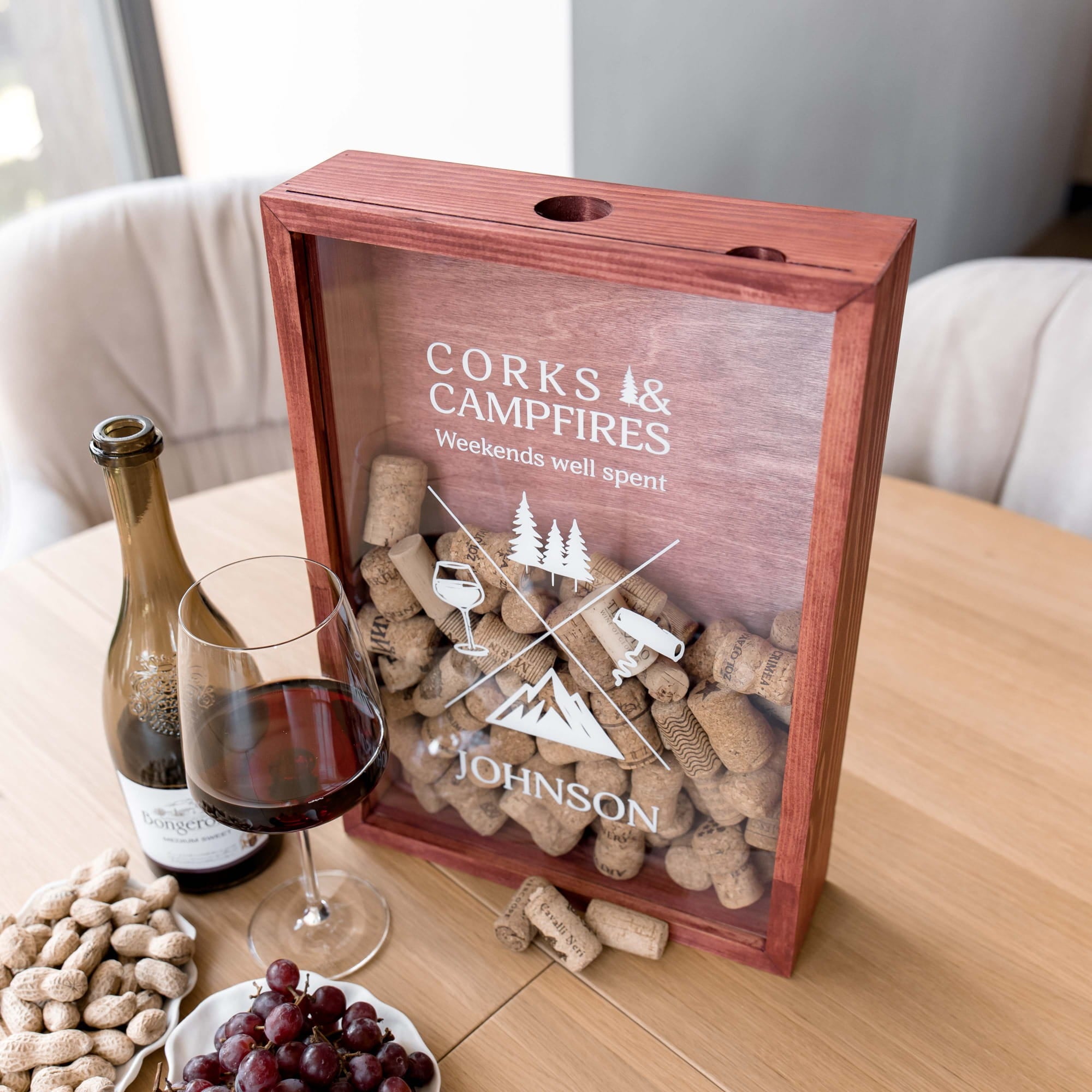 A personalized wooden wine gift box with a clear front panel