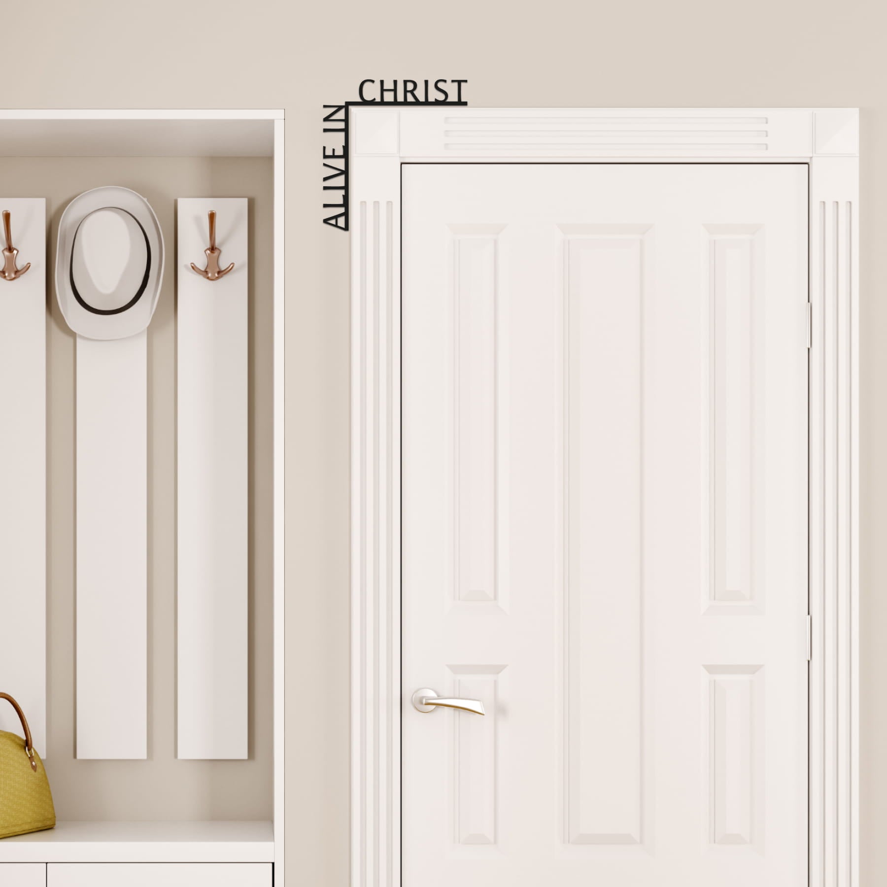 White door with 'Alive in Christ' wall decal, hooks on a wall with a hat and bag.