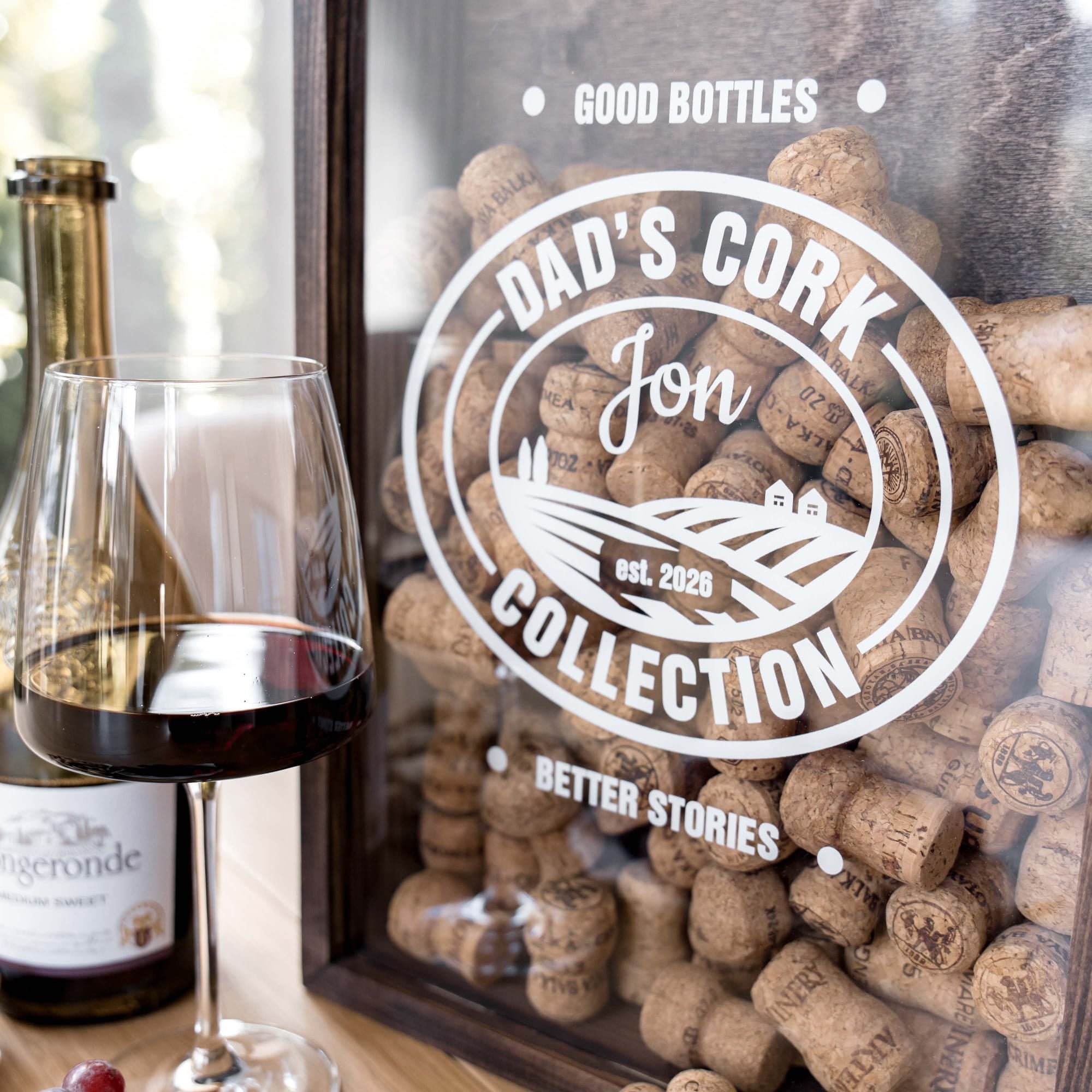 A framed display filled with wine corks