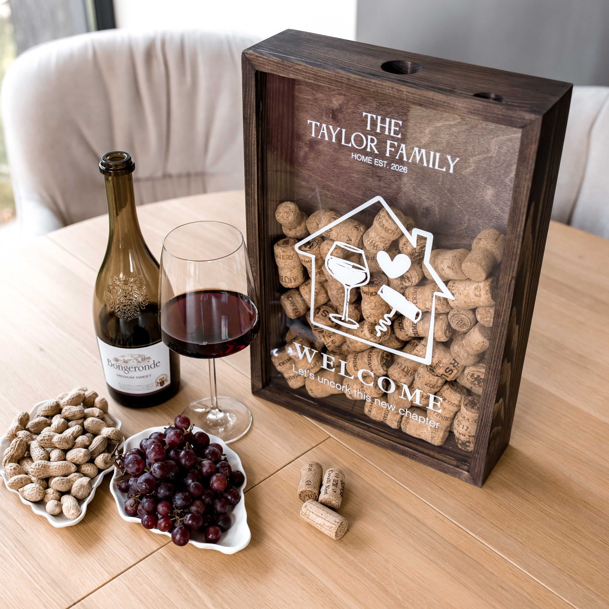A dark wood wine corkscrew gift box with a clear front panel