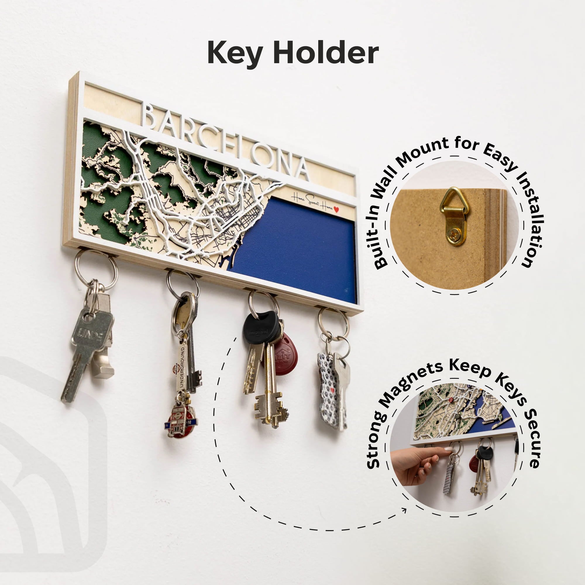 Key holder with a map design of Barcelona, featuring keys hanging from it.