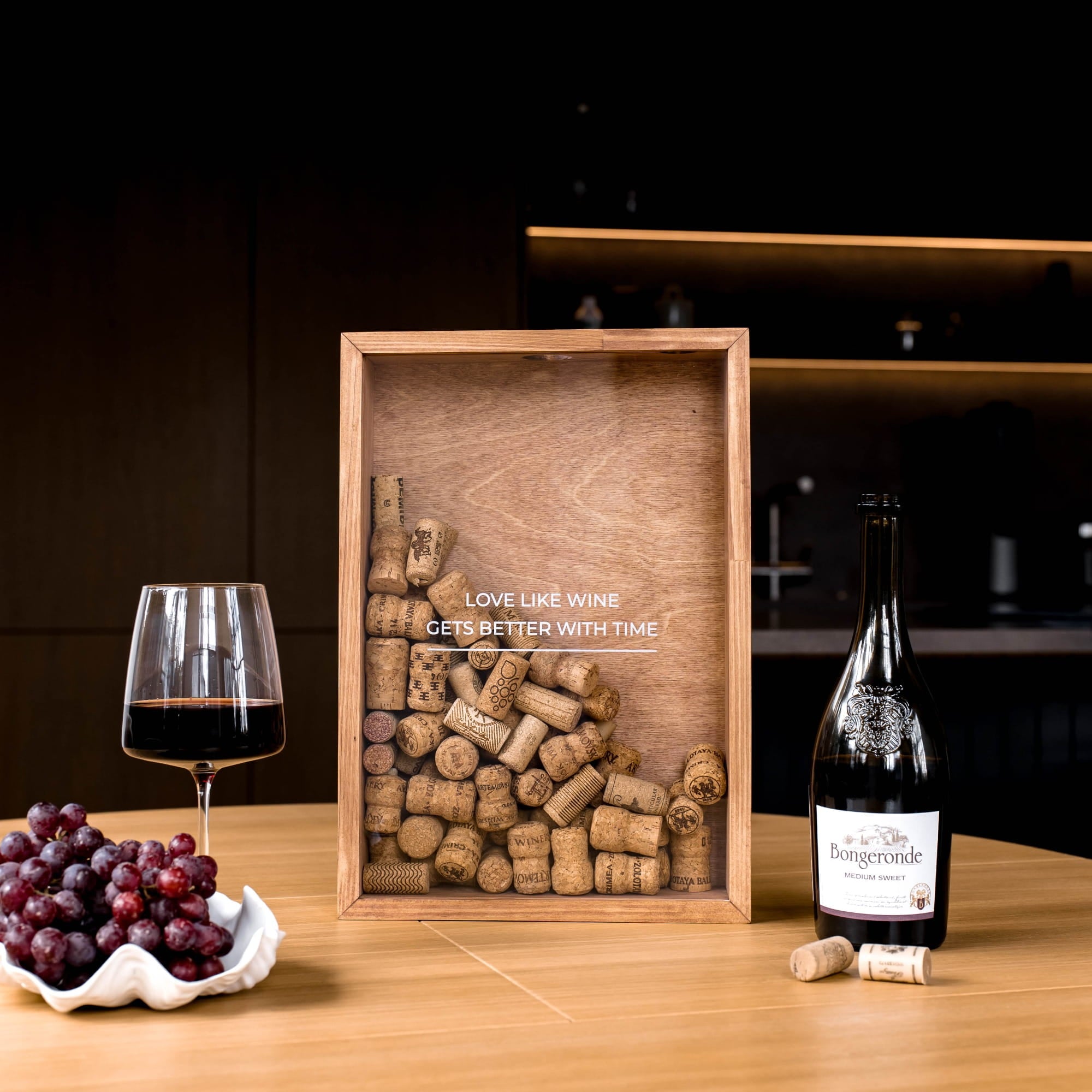 A wooden wine-themed tray filled with assorted wine corks