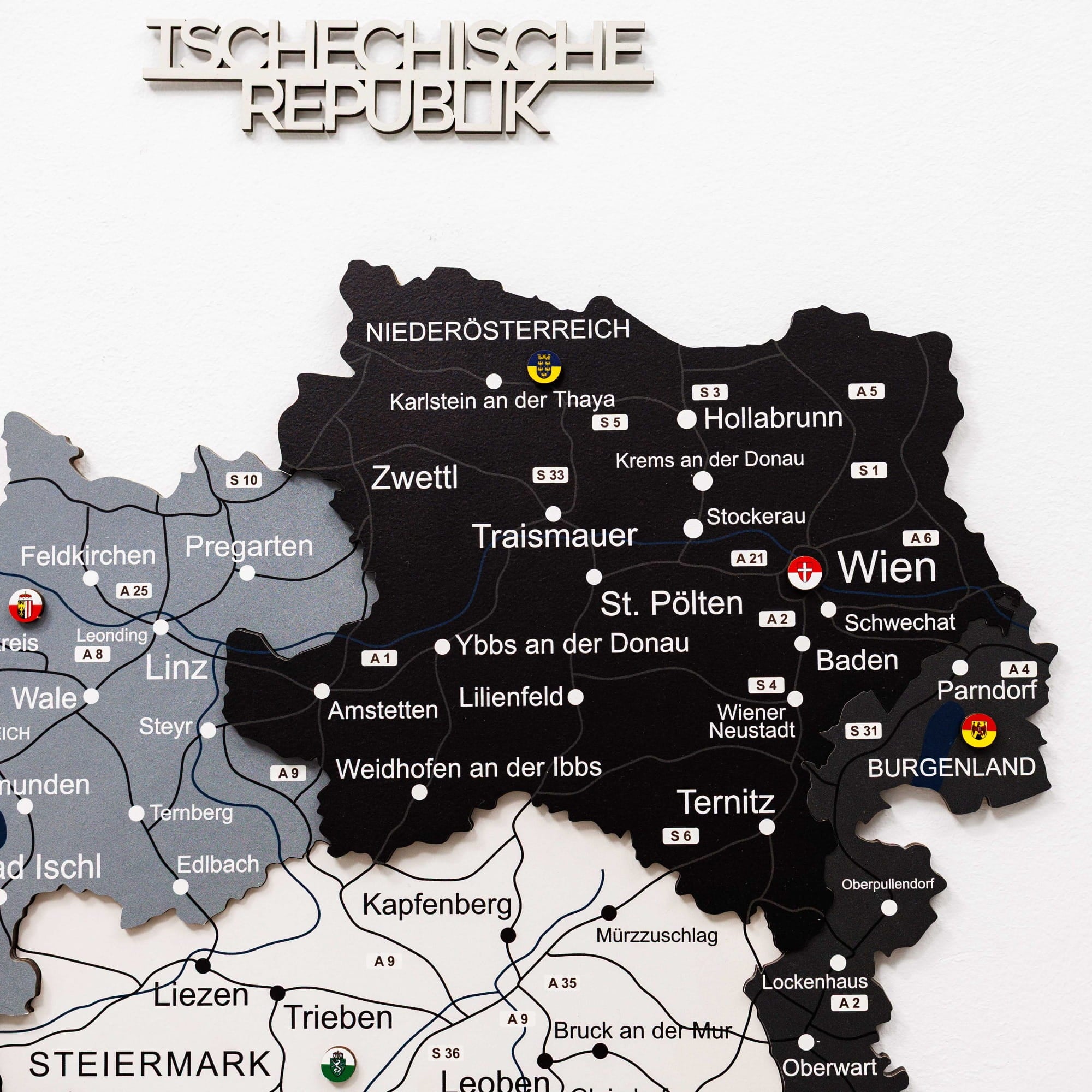 Map of Austria with cities labeled, featuring black and gray colors on a white background.