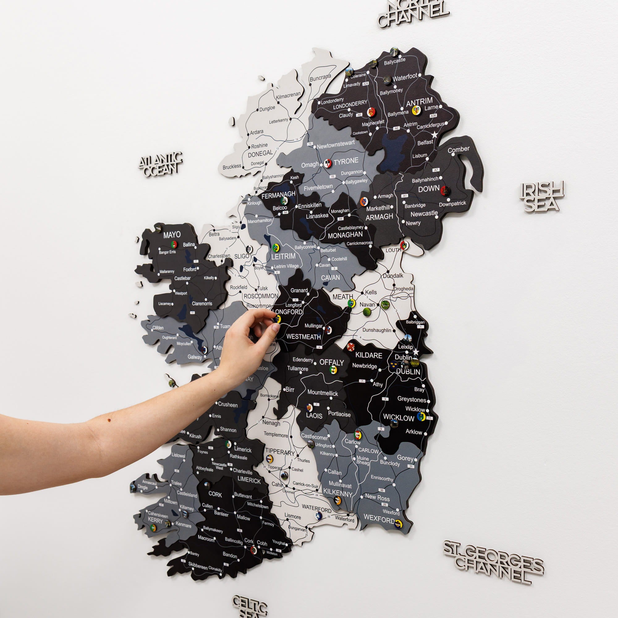 Map of England with regions labeled, hand pointing to a specific area on a white background.