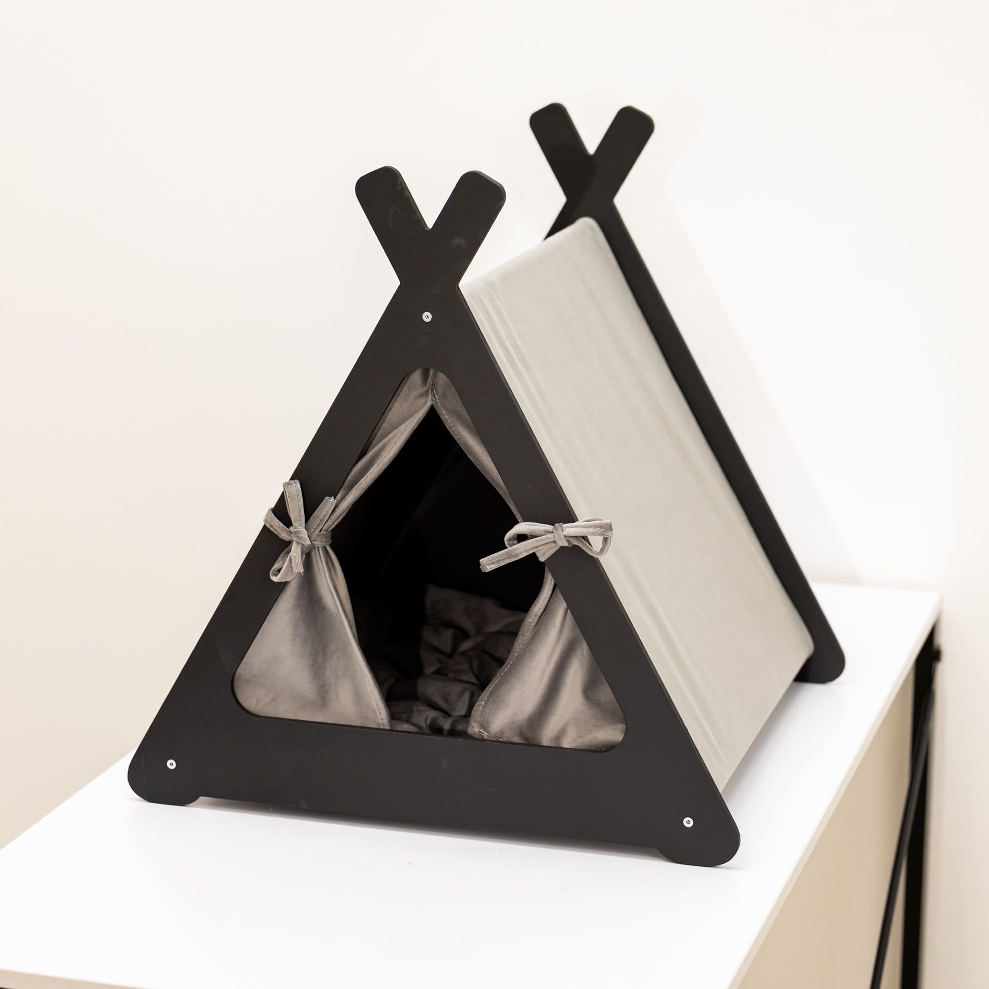 Black pet teepee with gray interior on a white background