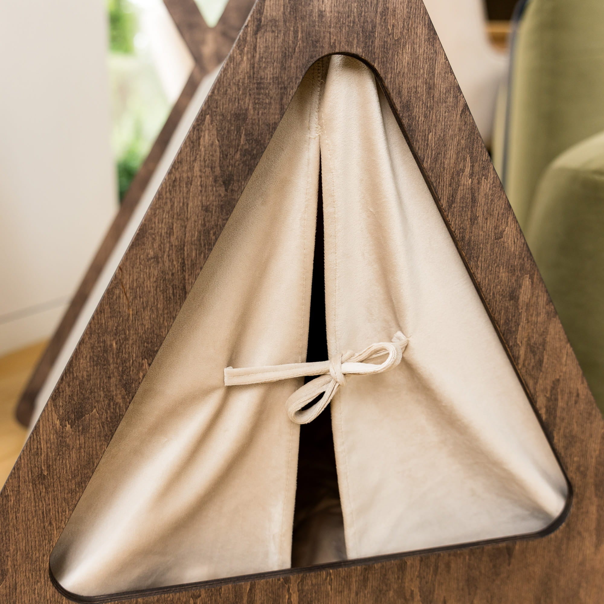 Wooden pet teepee with a beige interior
