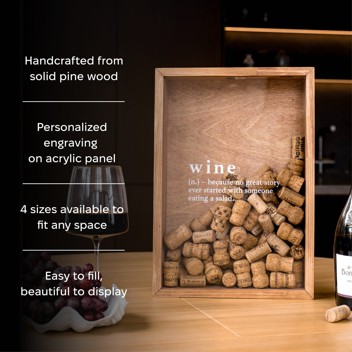 A rectangular wooden wine cork display box with an acrylic front panel 