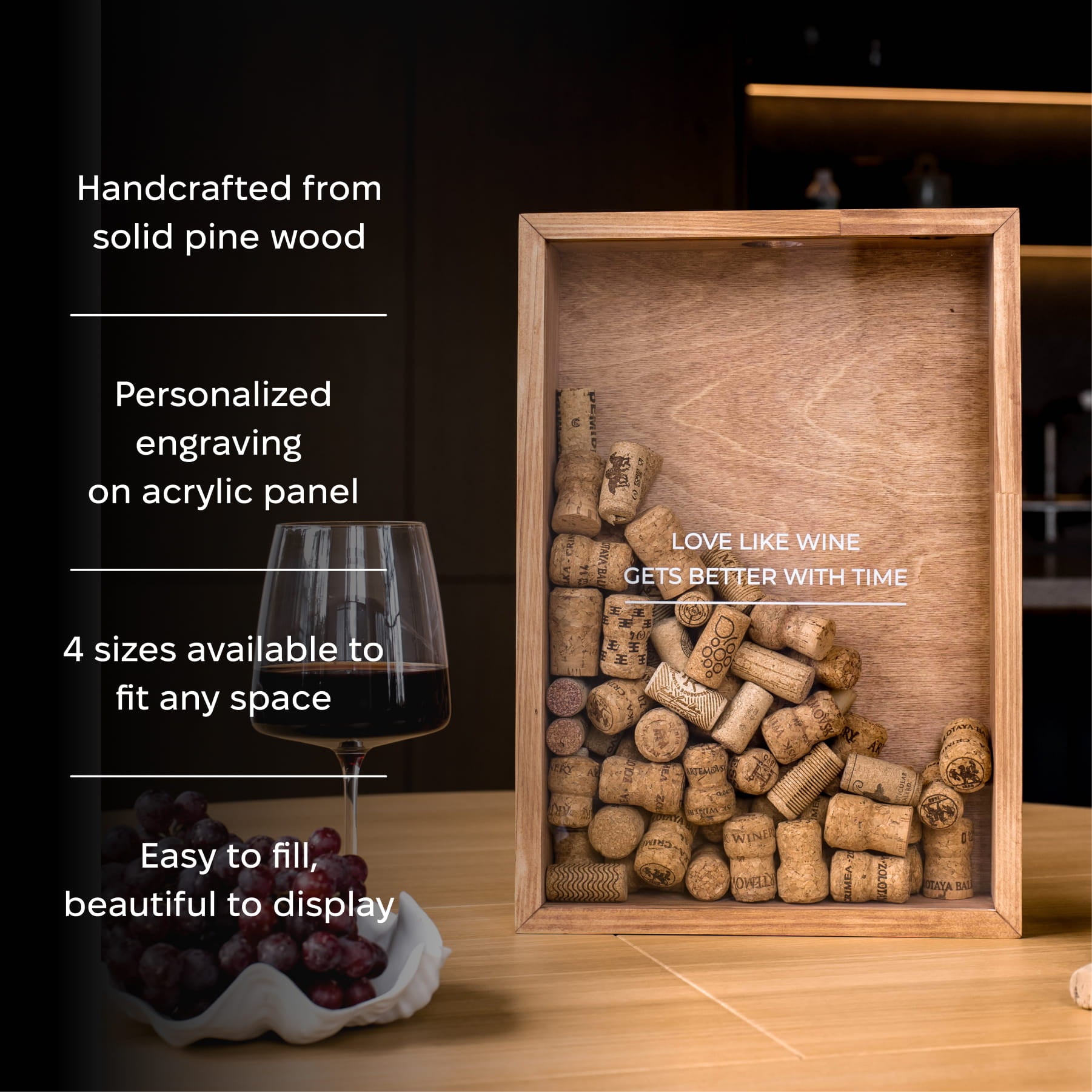 A wooden wine cork display box with a clear front panel