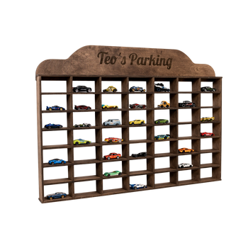 Wooden toy car parking garage with 'Teo's Parking' on top, filled with small model cars.