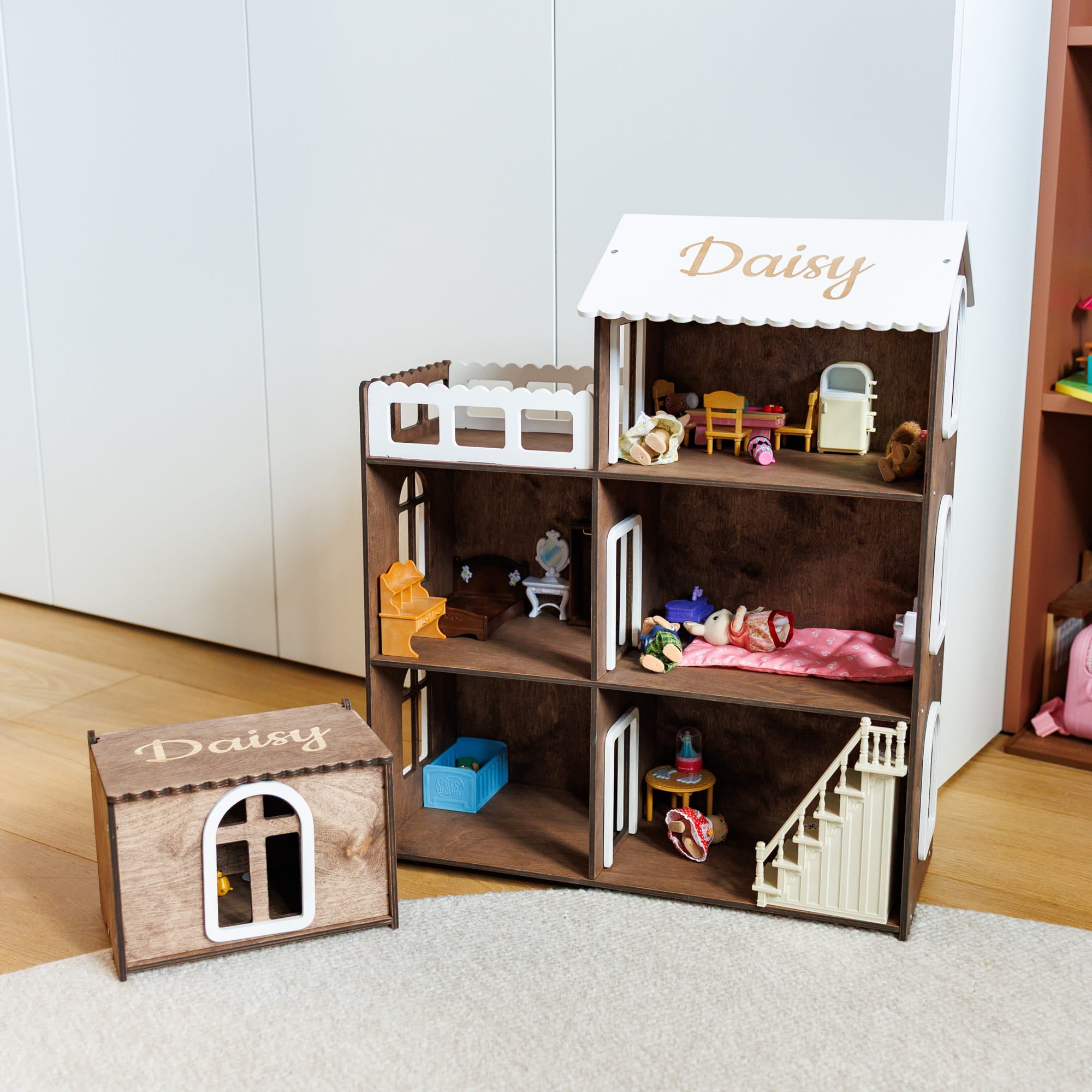 large dark brown wooden dollhouse