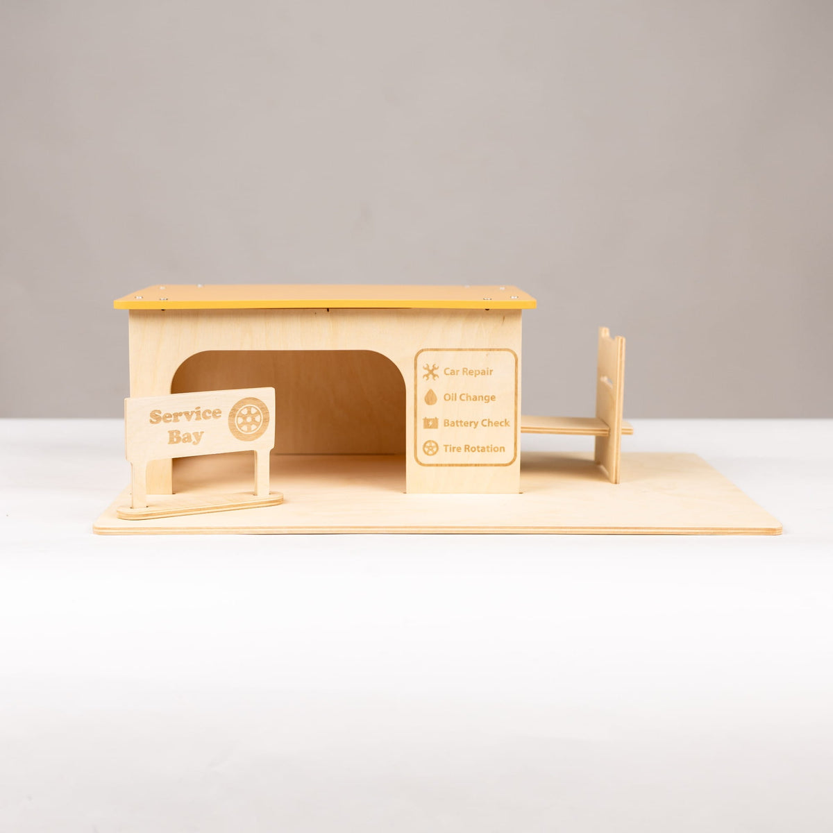 Spielzeug für die Autowerkstatt aus Holz
