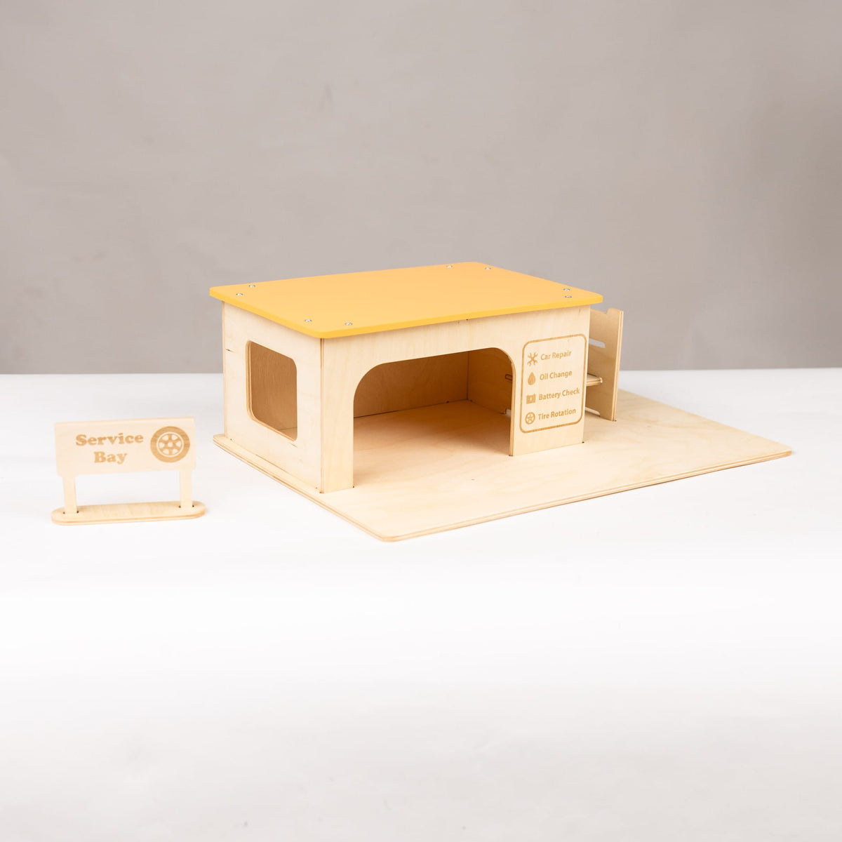 Spielzeug für die Autowerkstatt aus Holz