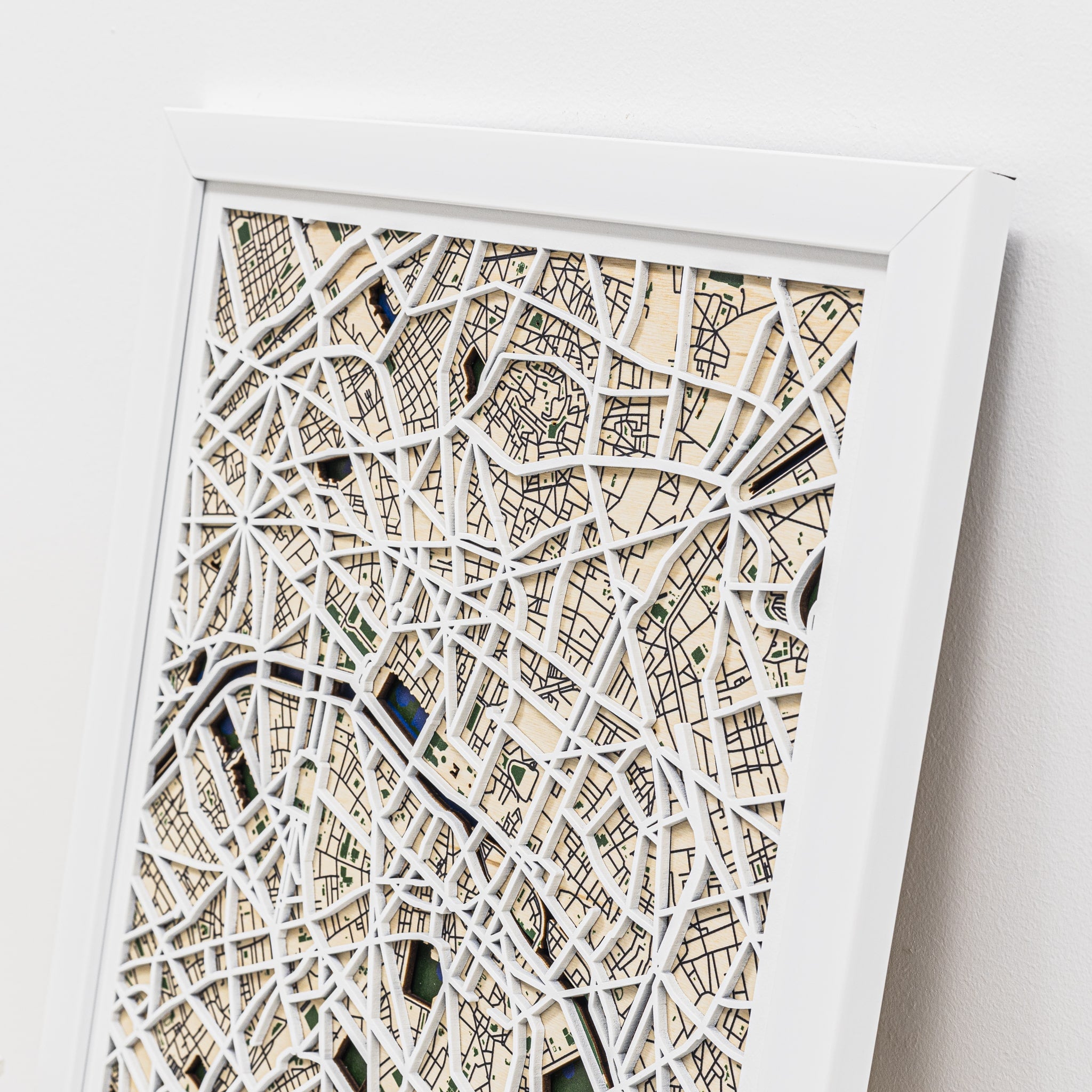 Framed city map art on a white background