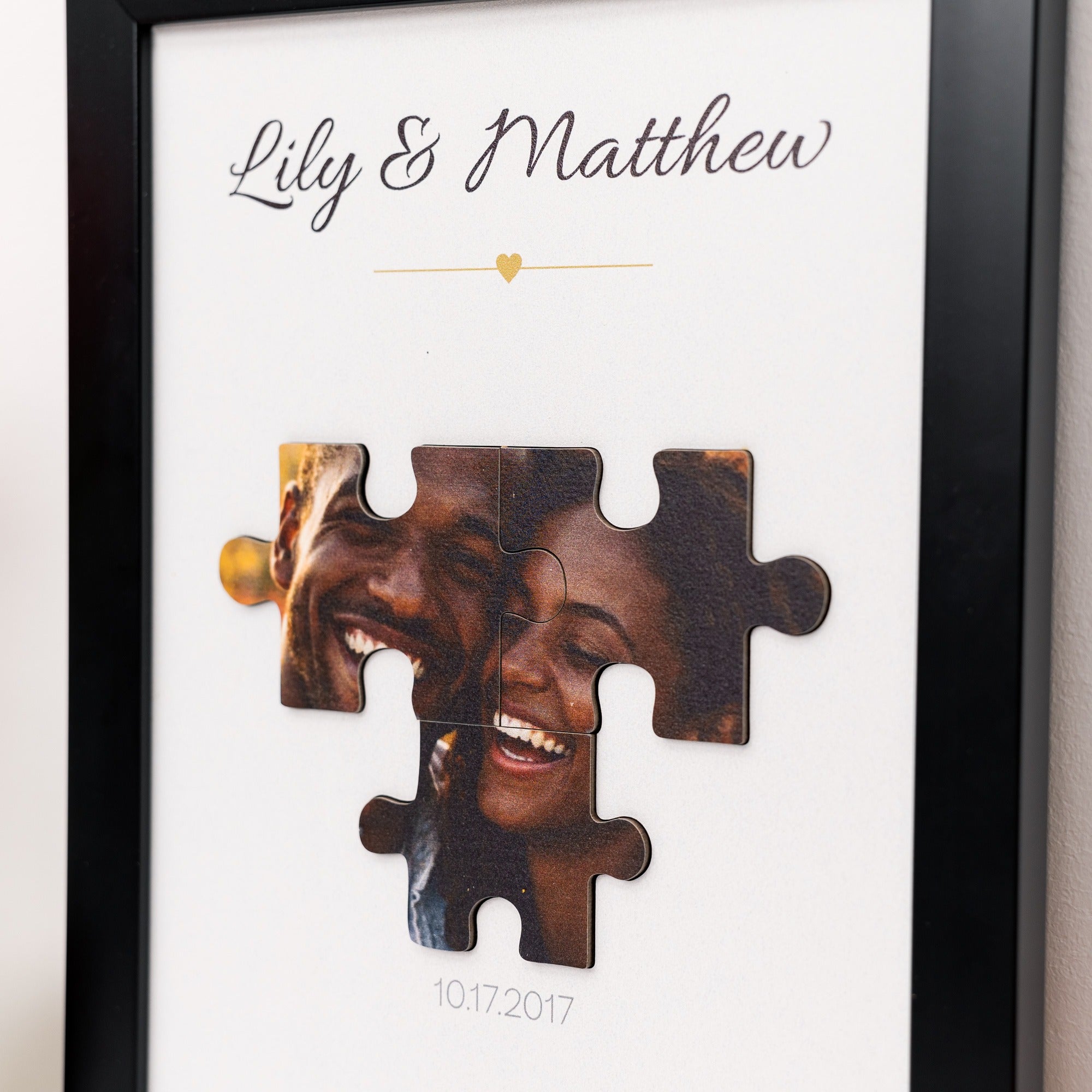 Framed puzzle with a couple's photo and names 'Lily & Matthew' on a white background