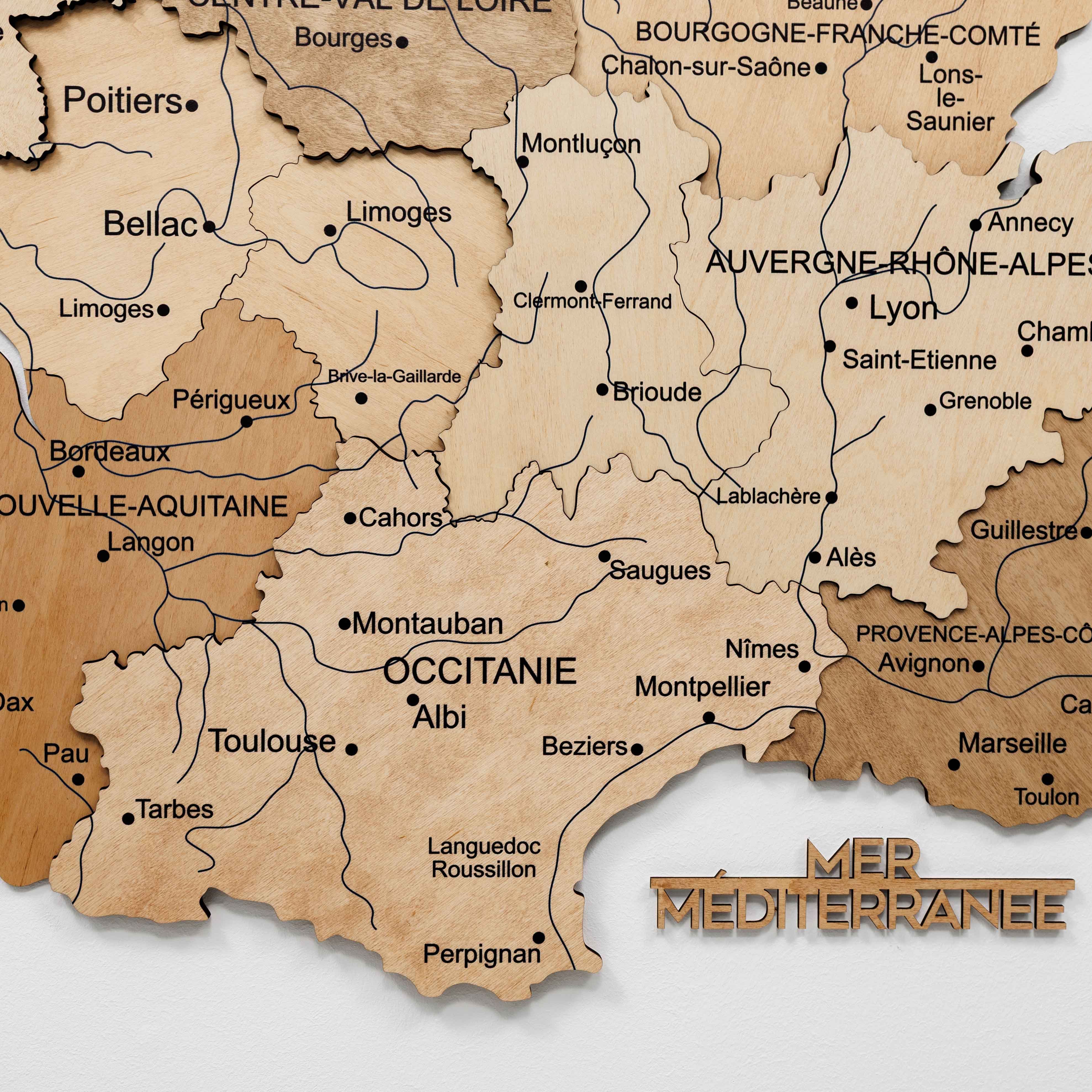 Wooden map of France with regions labeled