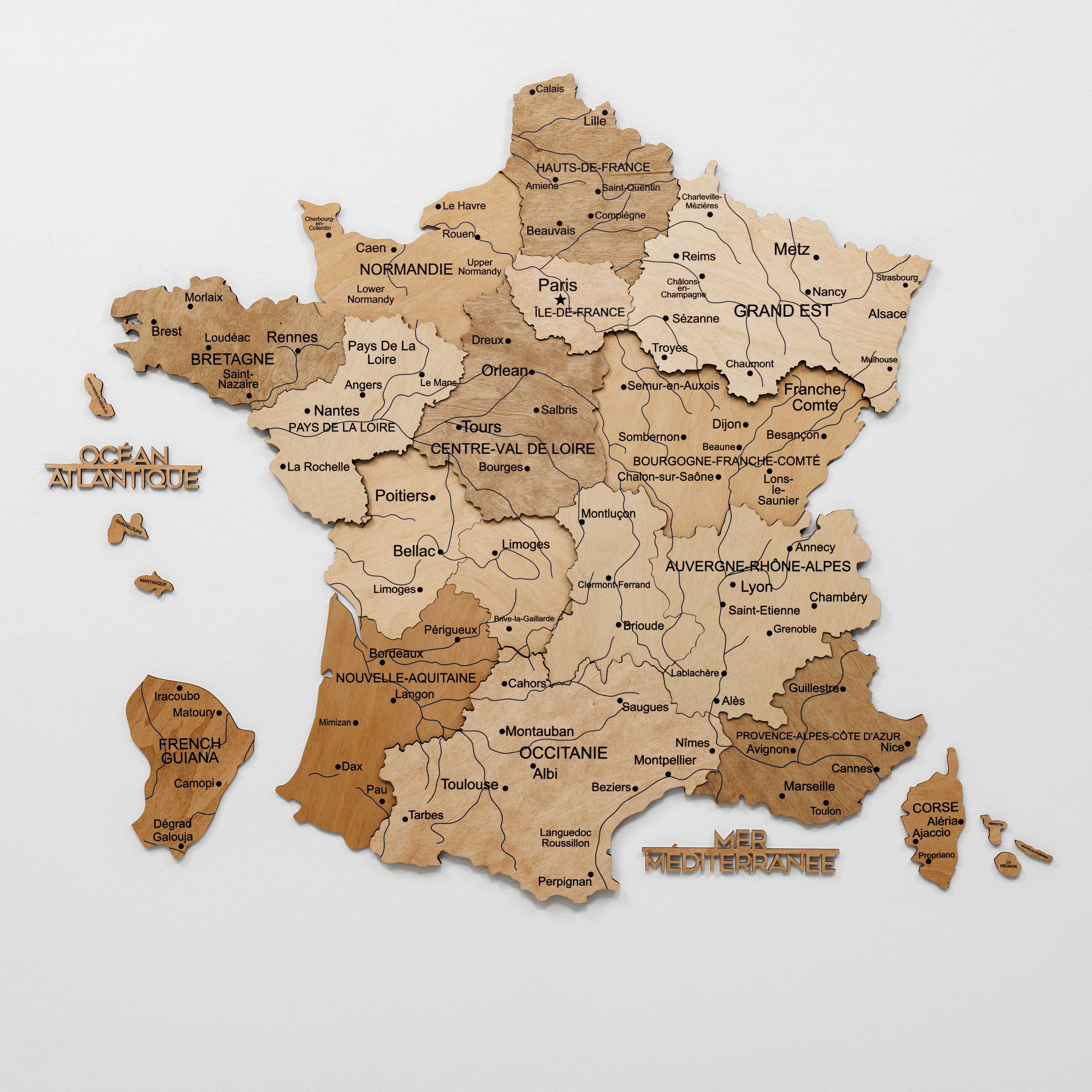 Wooden map of France with regions on a white background