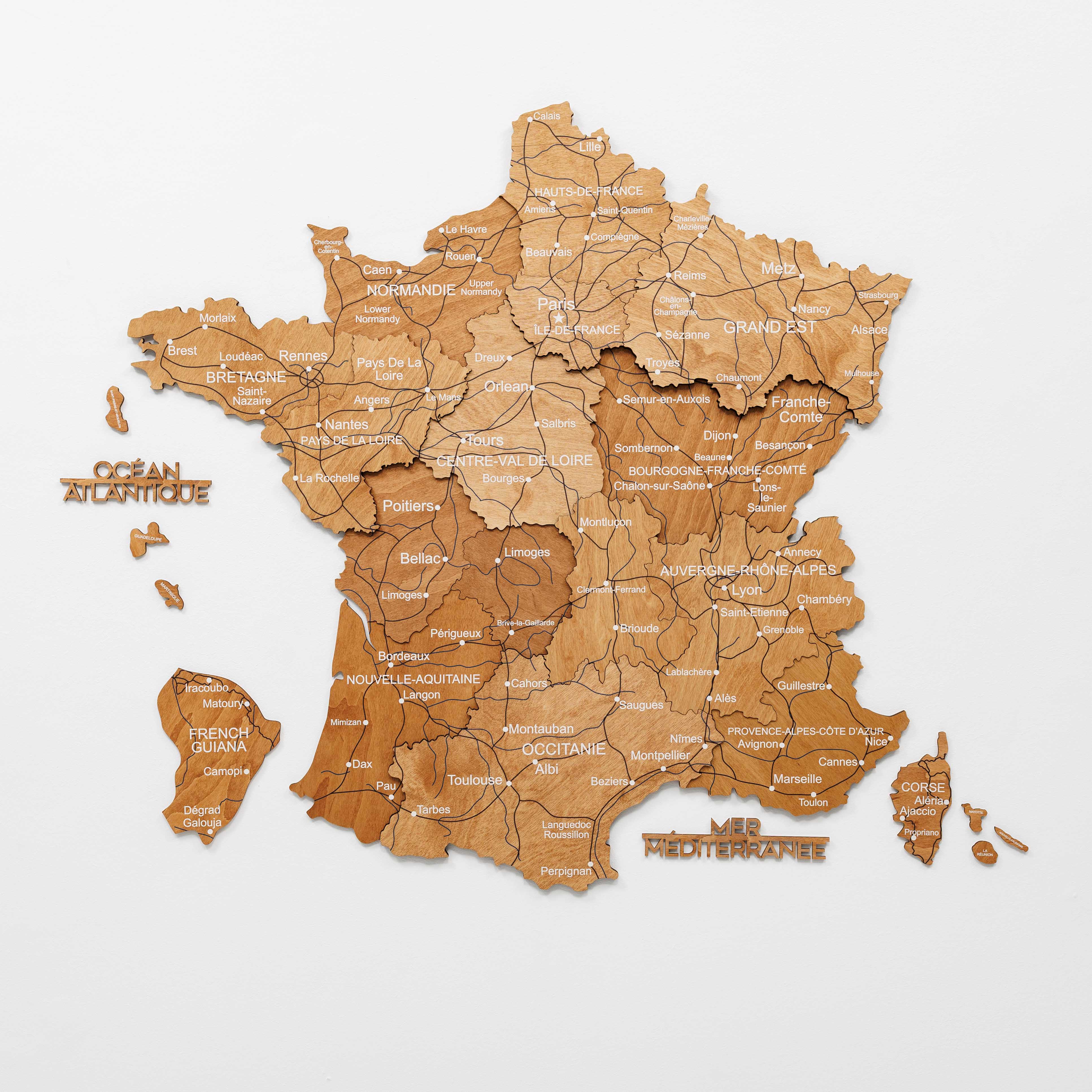 Wooden map of France with regions labeled on a white background
