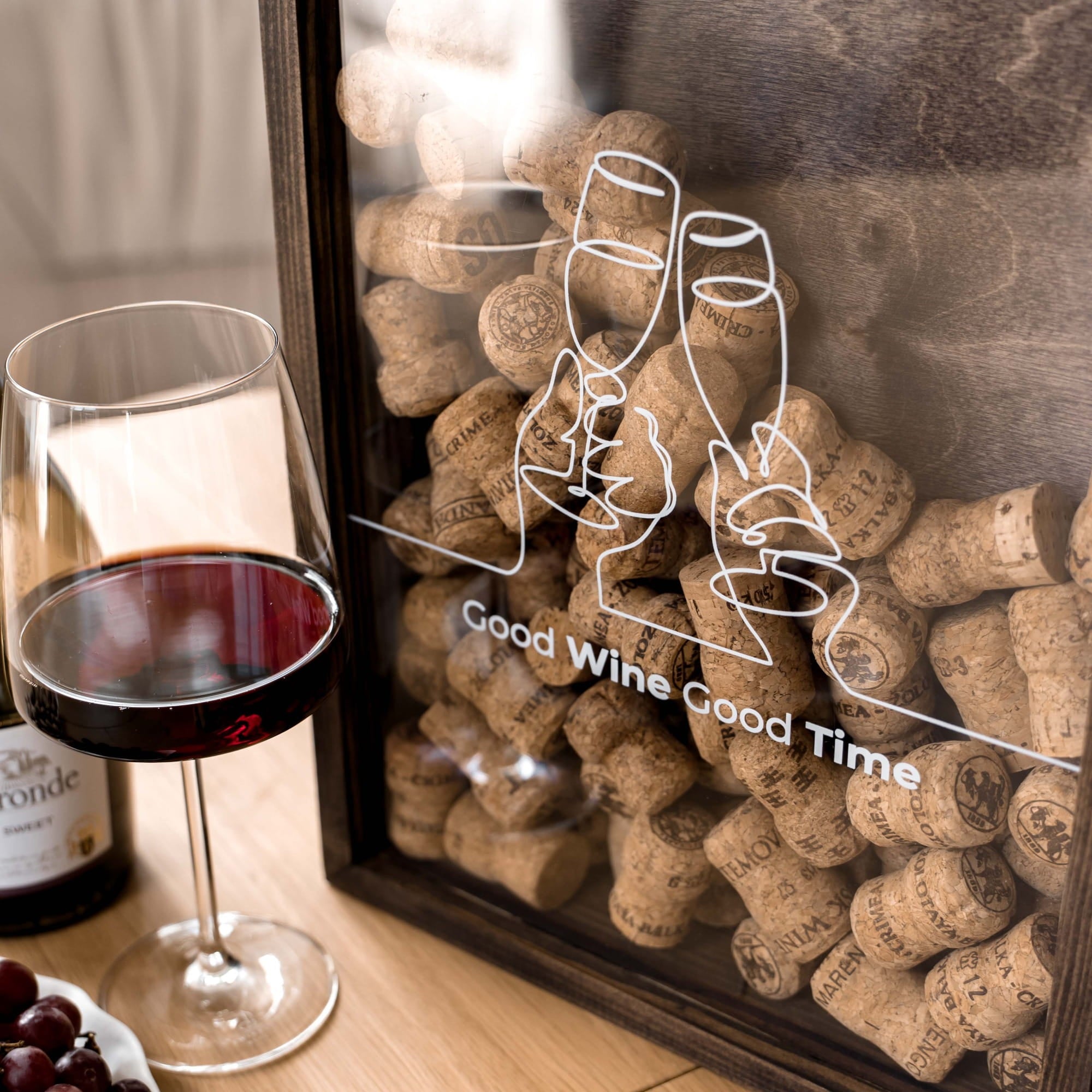 A framed wall art piece filled with wine corks