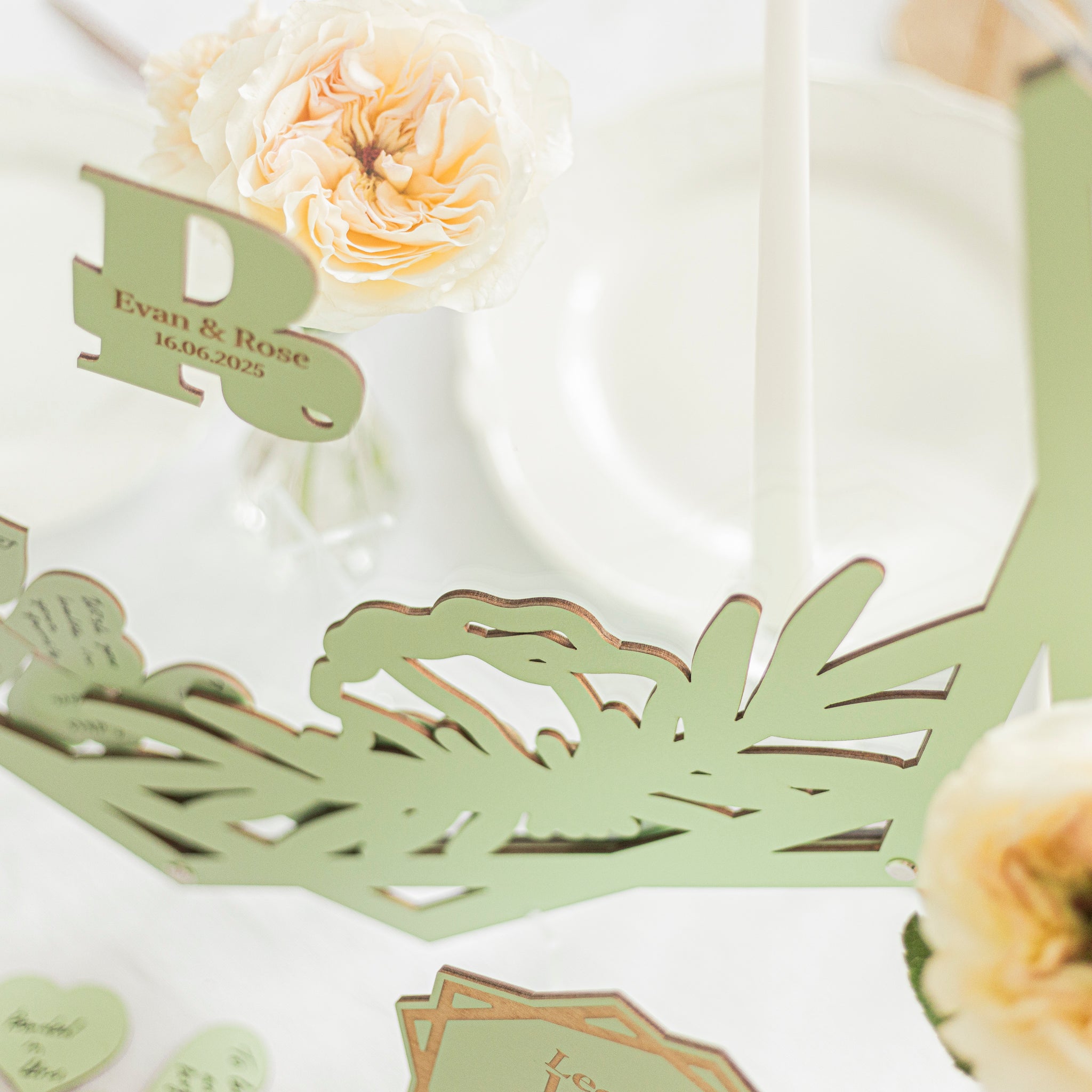 Decorative green card with floral elements and text on a white background
