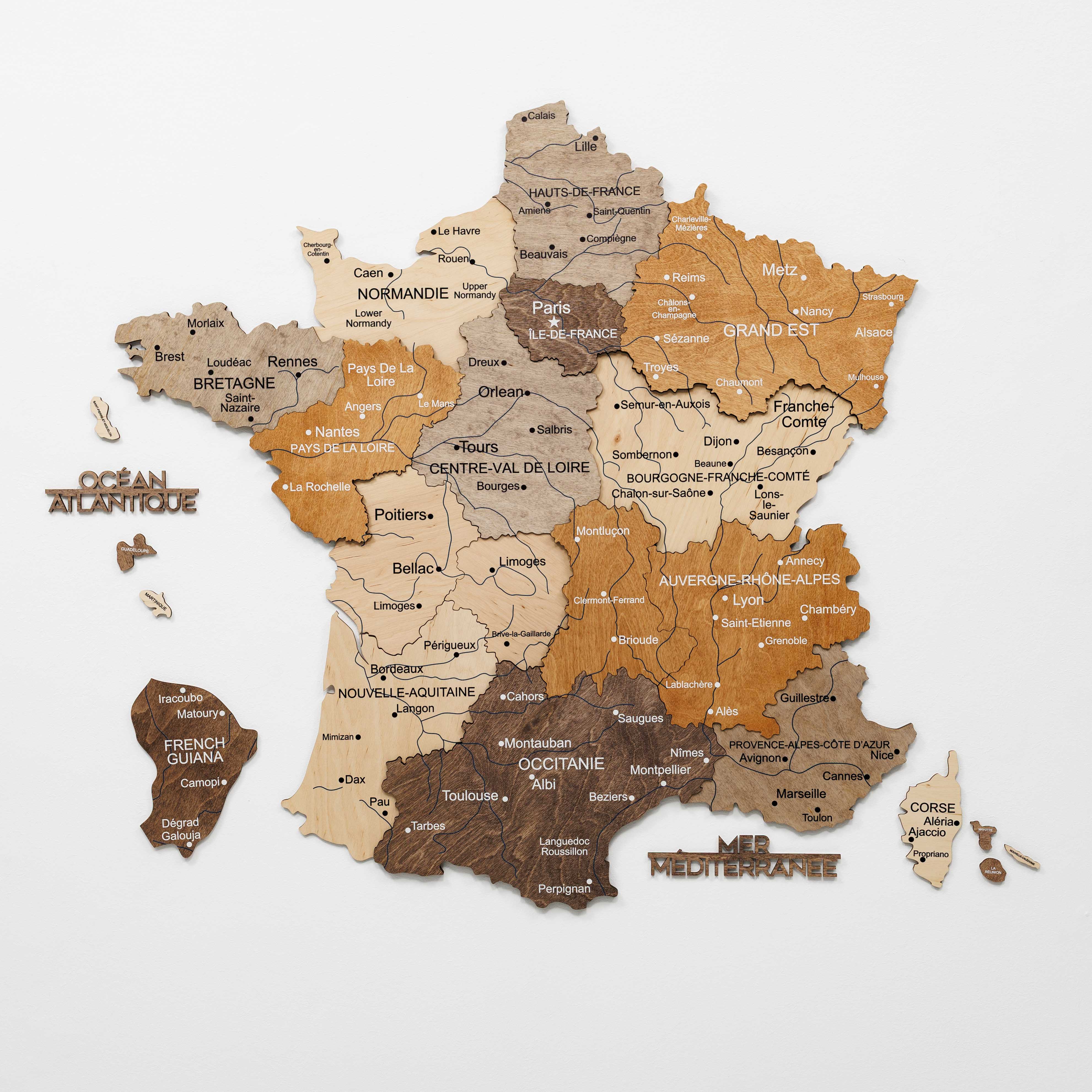 Wooden map of France with regions labeled on a white background