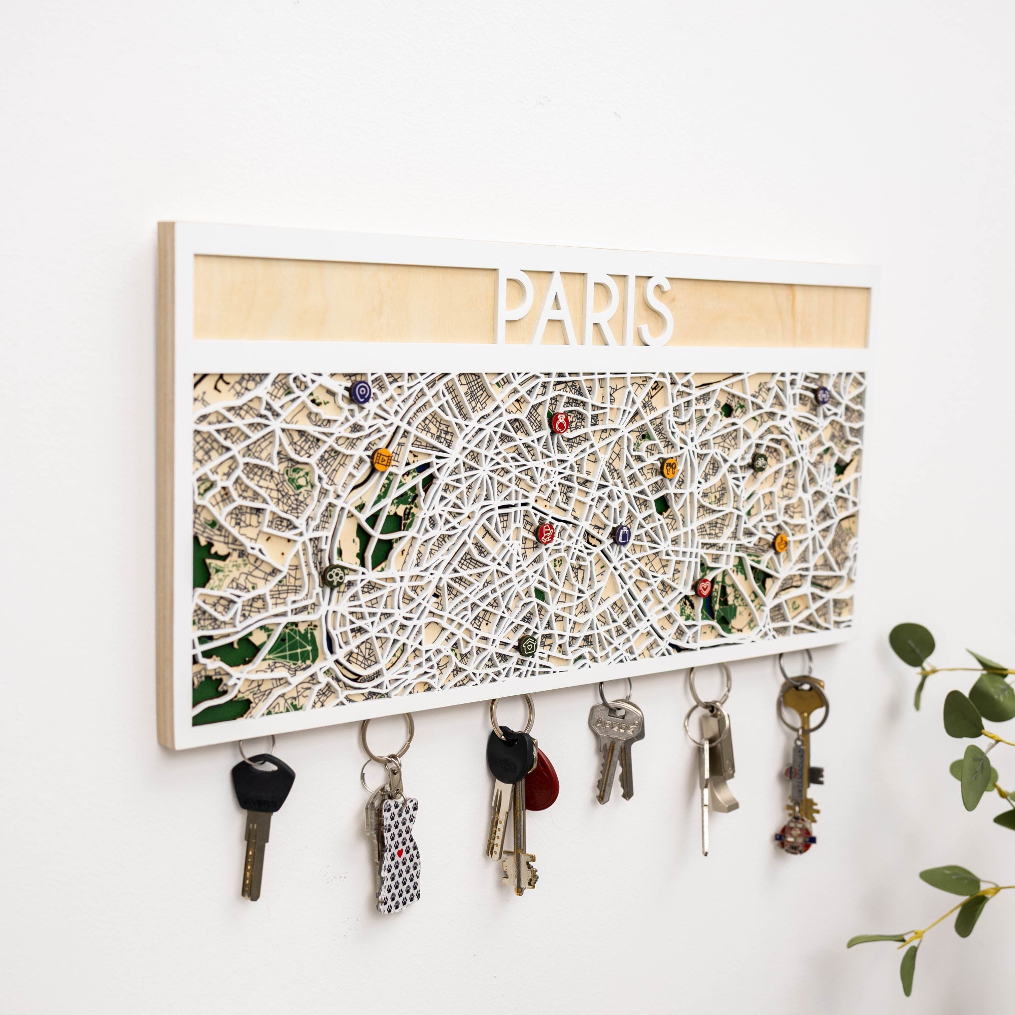 Key holder with Paris map design on a white wall