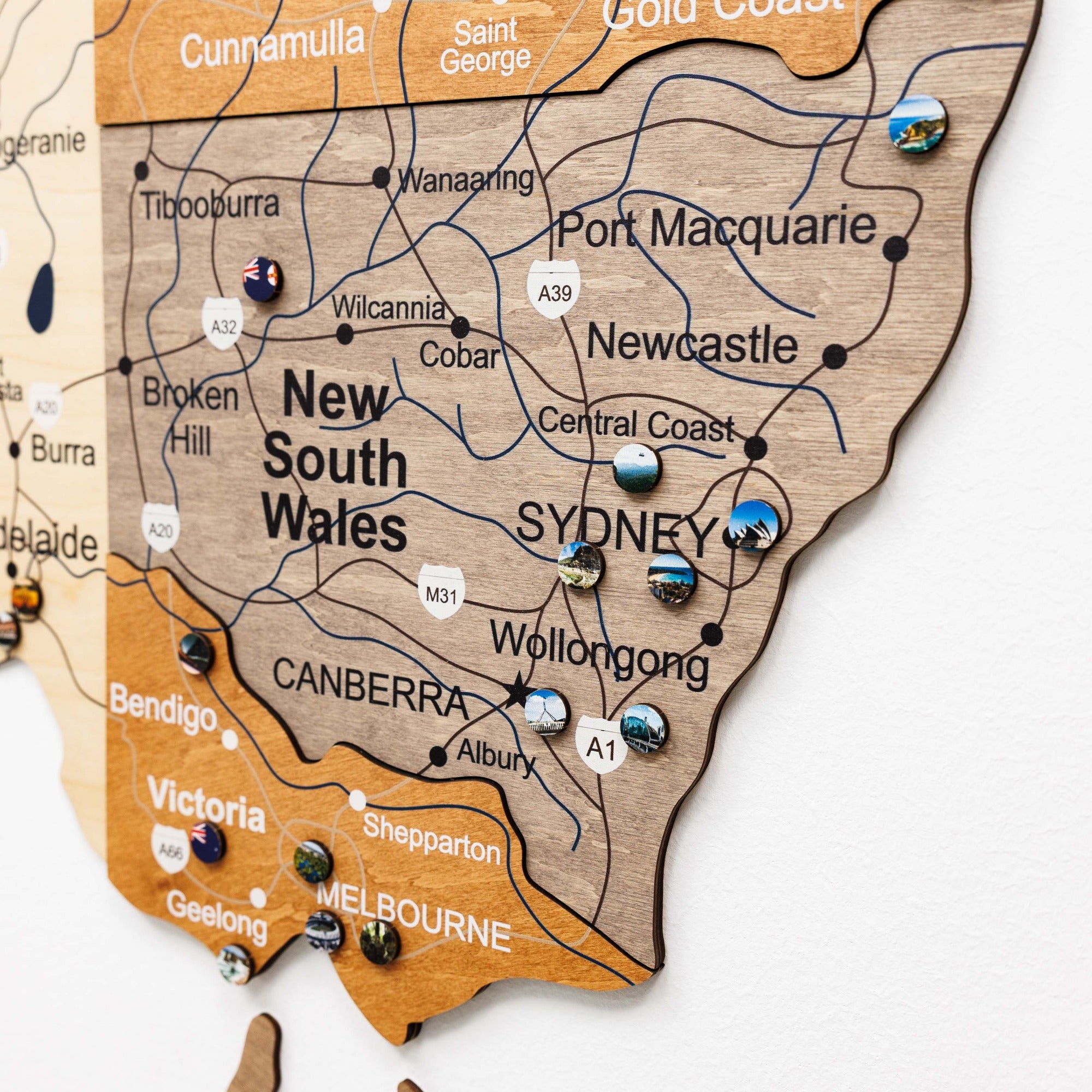 Wooden map of New South Wales with cities labeled
