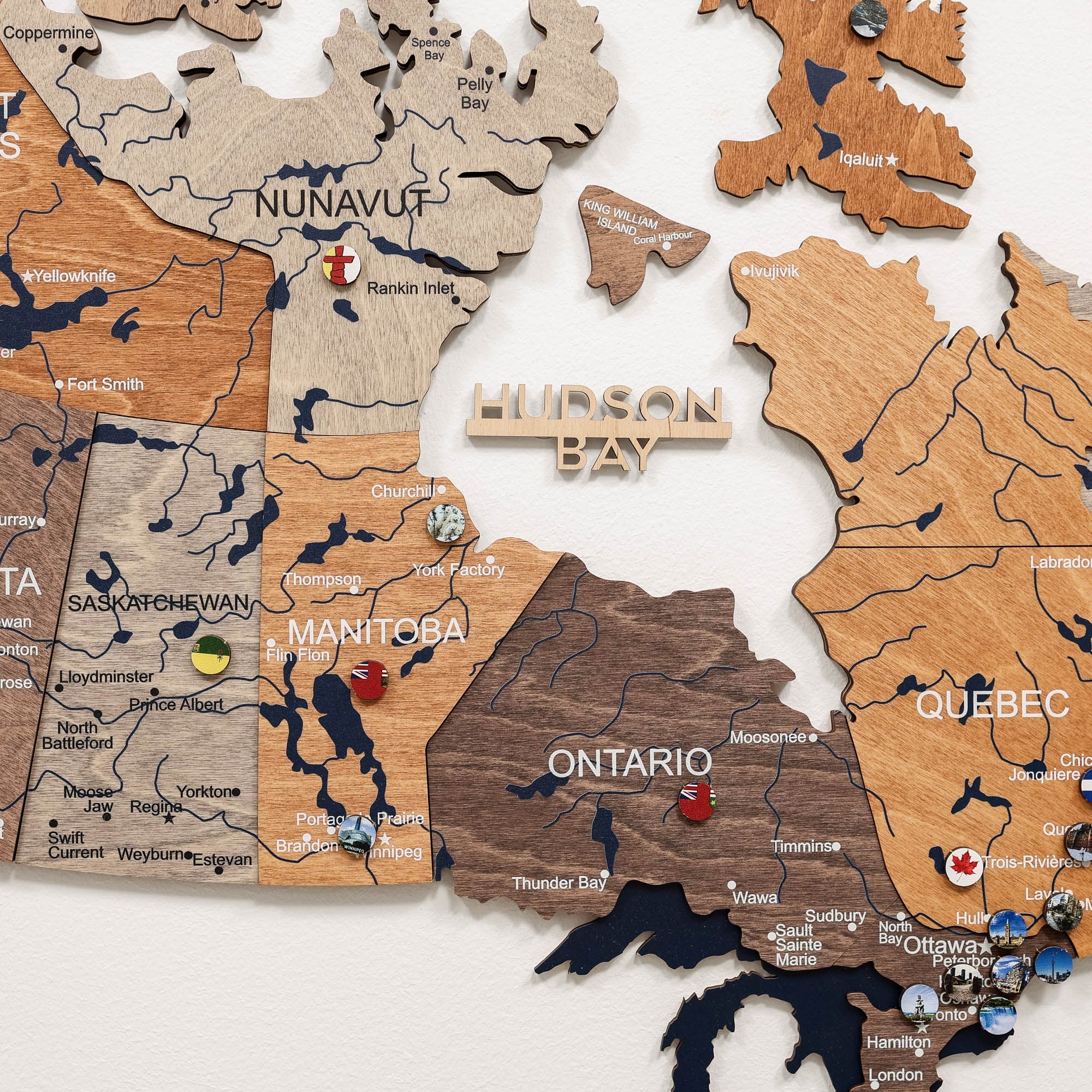 Wooden map of Canada with provinces and territories labeled