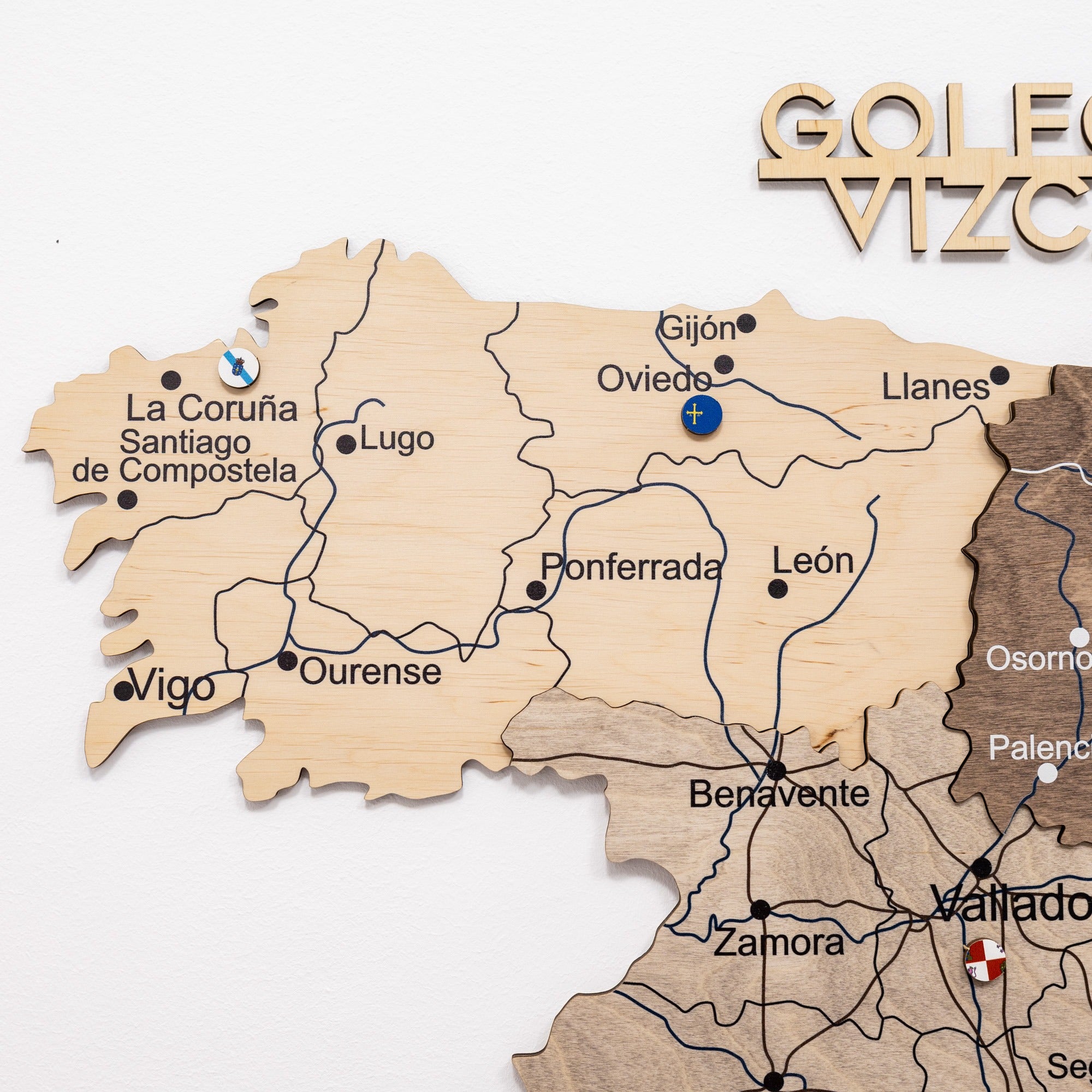 Wooden map of Spain with Gijón highlighted