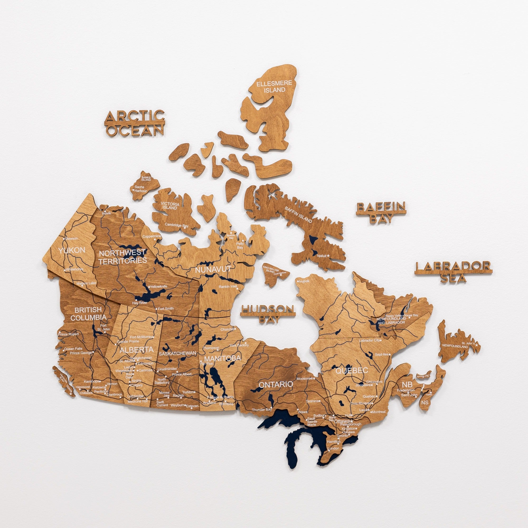 Wooden map of Canada on a white background