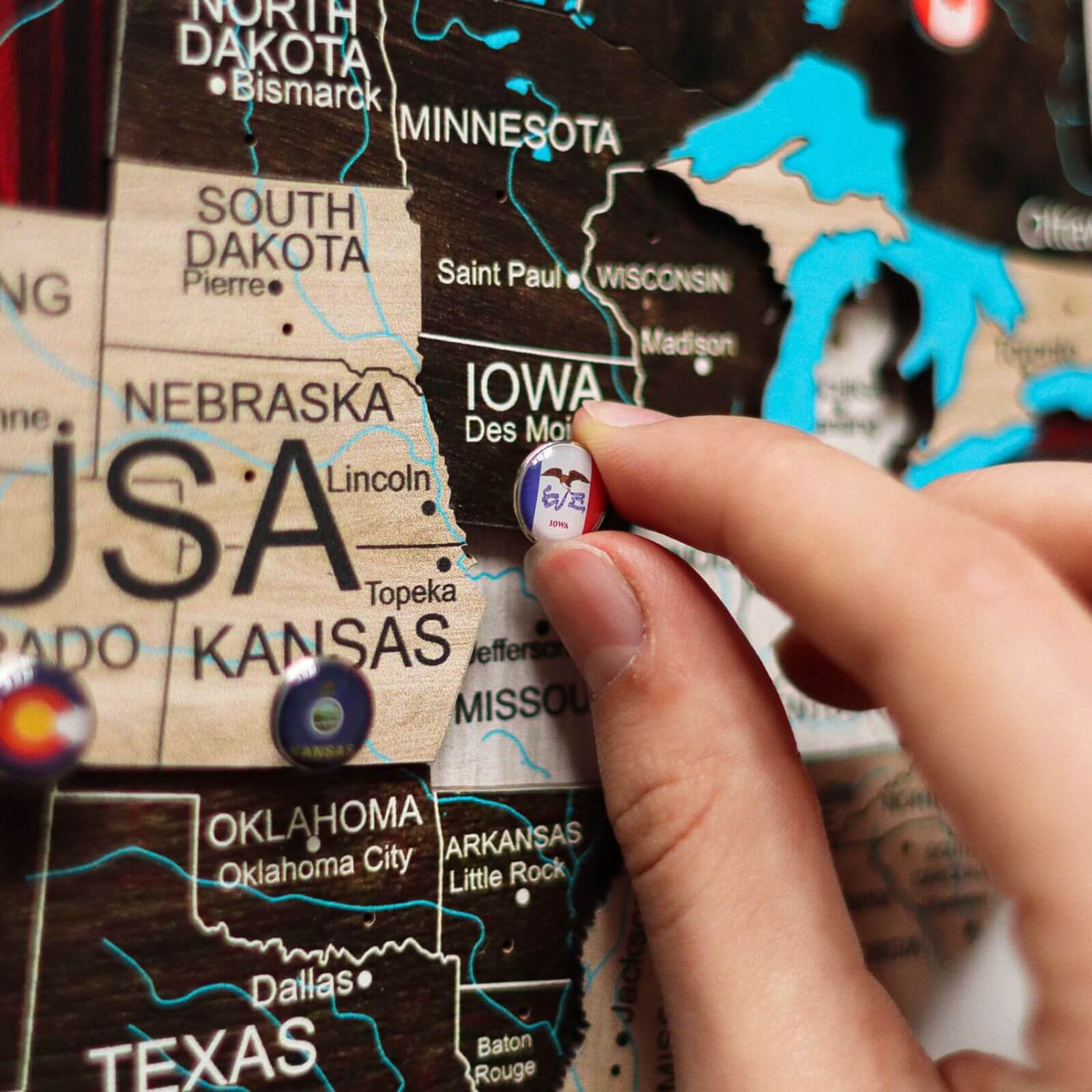 world map with pins to mark travels